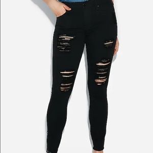 Express black mid rise ripped jeggings